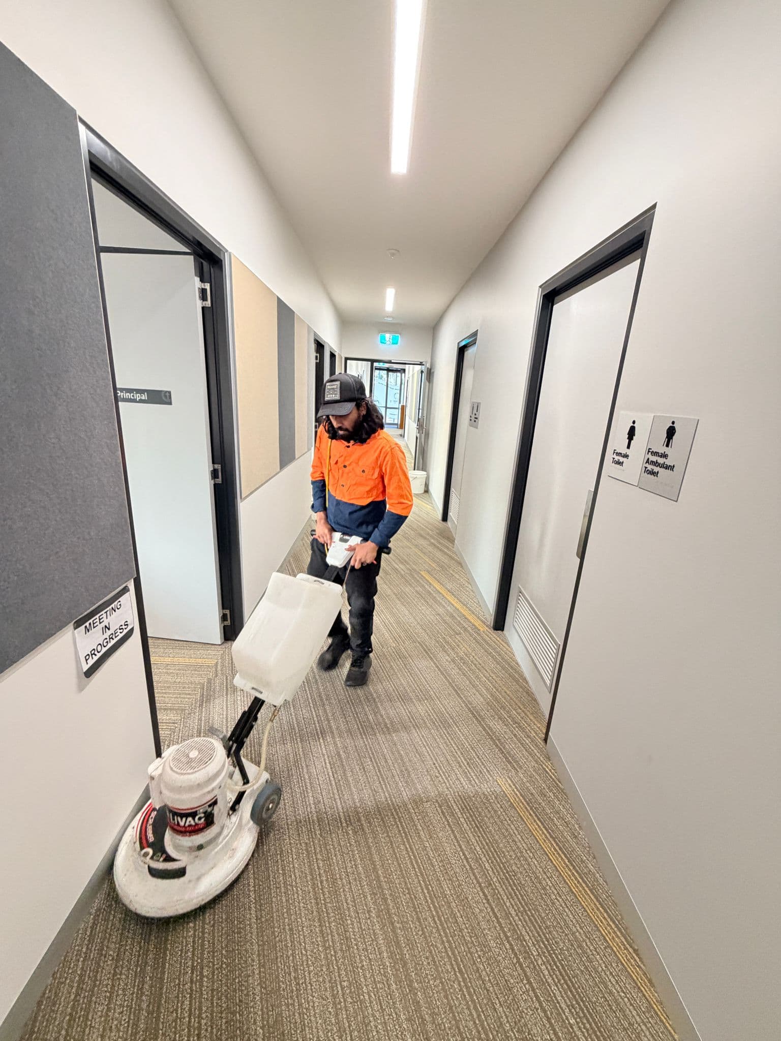 Commercial cleaning professional at work